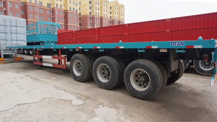 Tri Axle 48ft Flatbed Semi Trailer for Sale with Container Lock