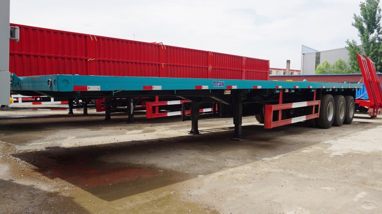 Tri Axle 48ft Flatbed Semi Trailer for Sale with Container Lock