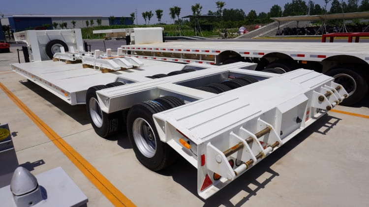 2 Line 4 Axle 100t Lowbed Trailer Truck Transport for Sale in Ghana